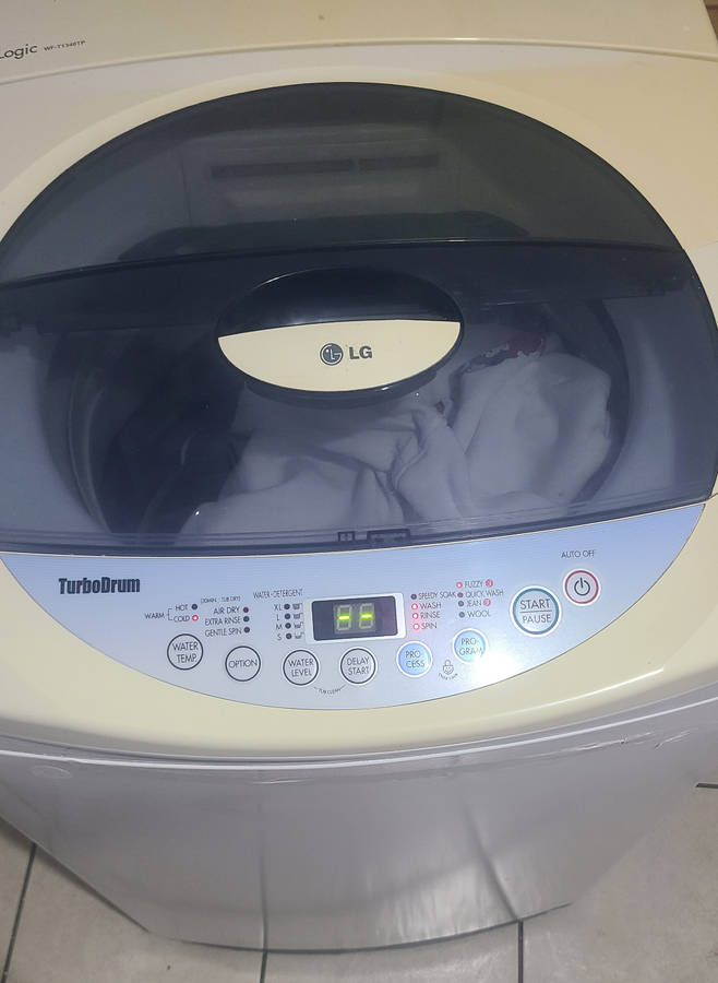 13kg LG turbodrum fuzzy logic Top Loader Washing Machine