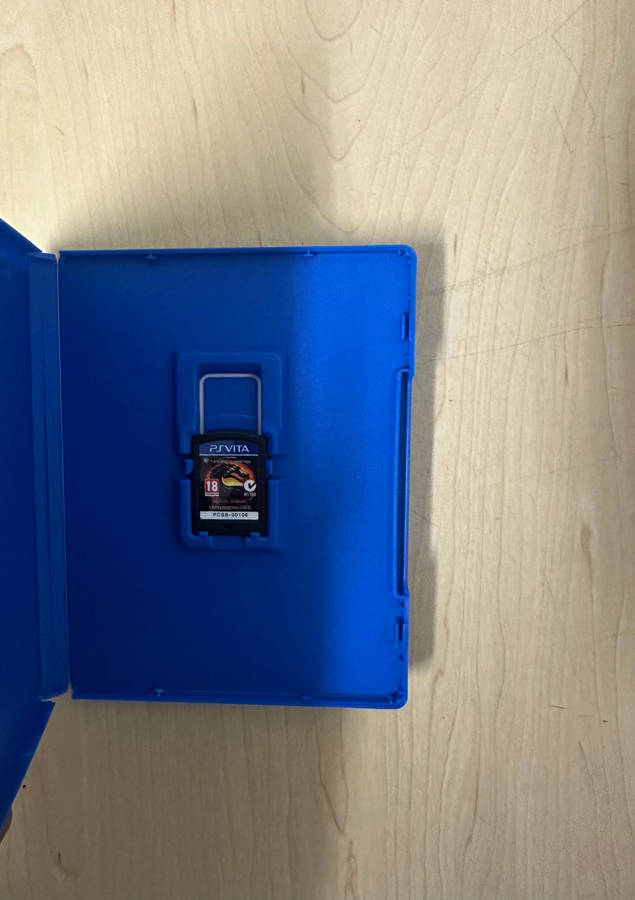 PS Vita Games Bundle + Cartridge Case
