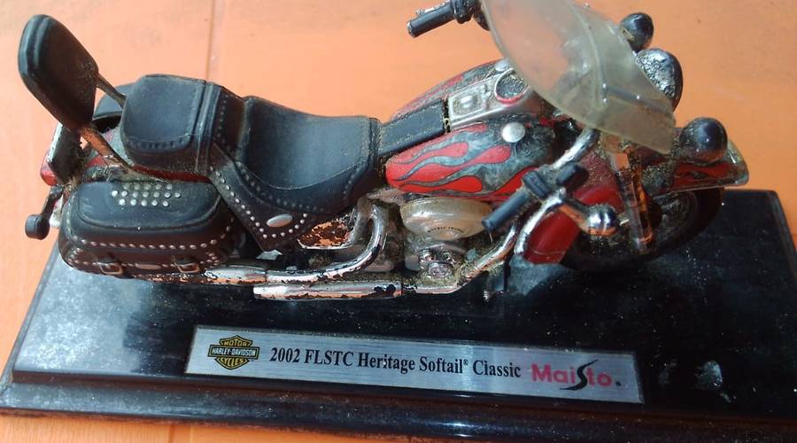vintage Harley bike on stand.