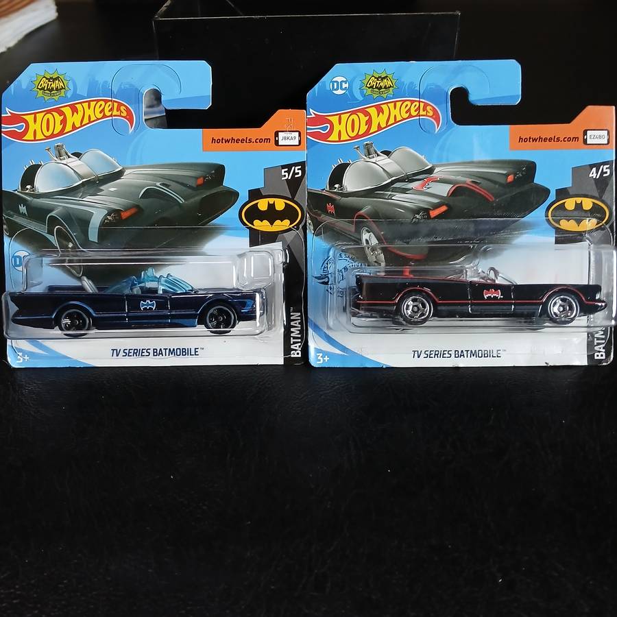 two Hot Wheels diecast models of the Batmobile from the 1966 Batman TV series