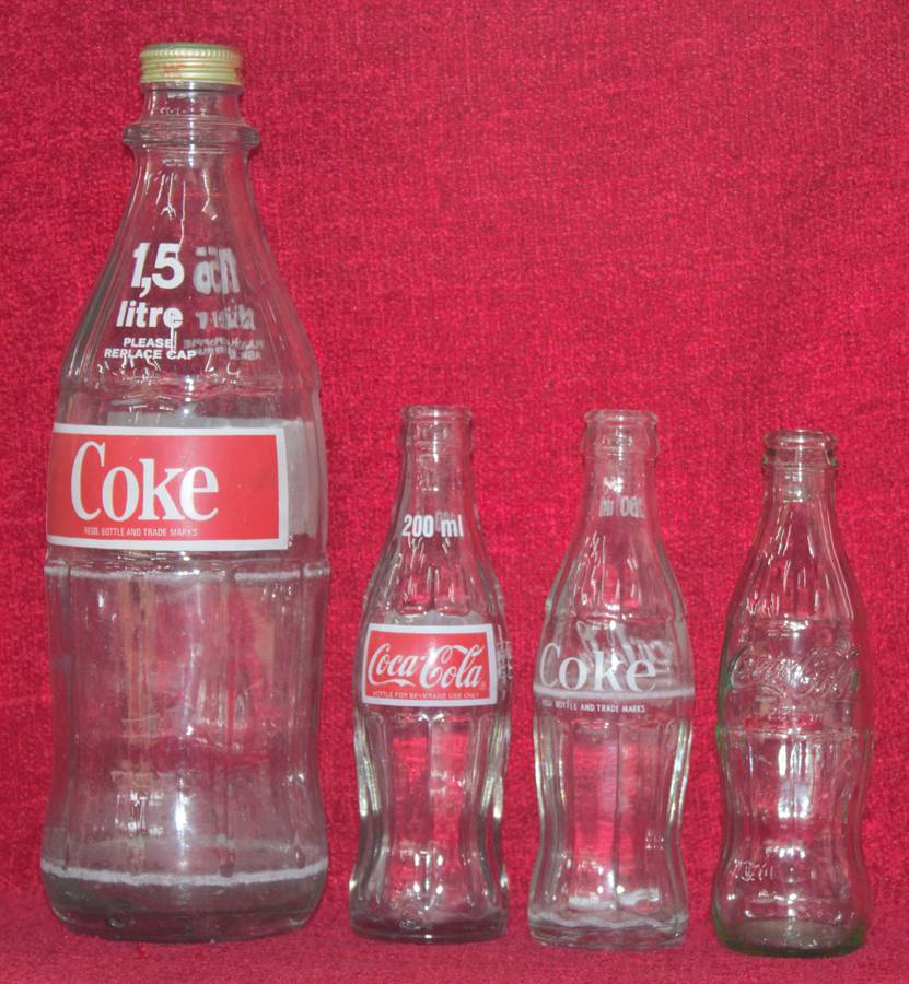 Coca Cola Bottles x 4