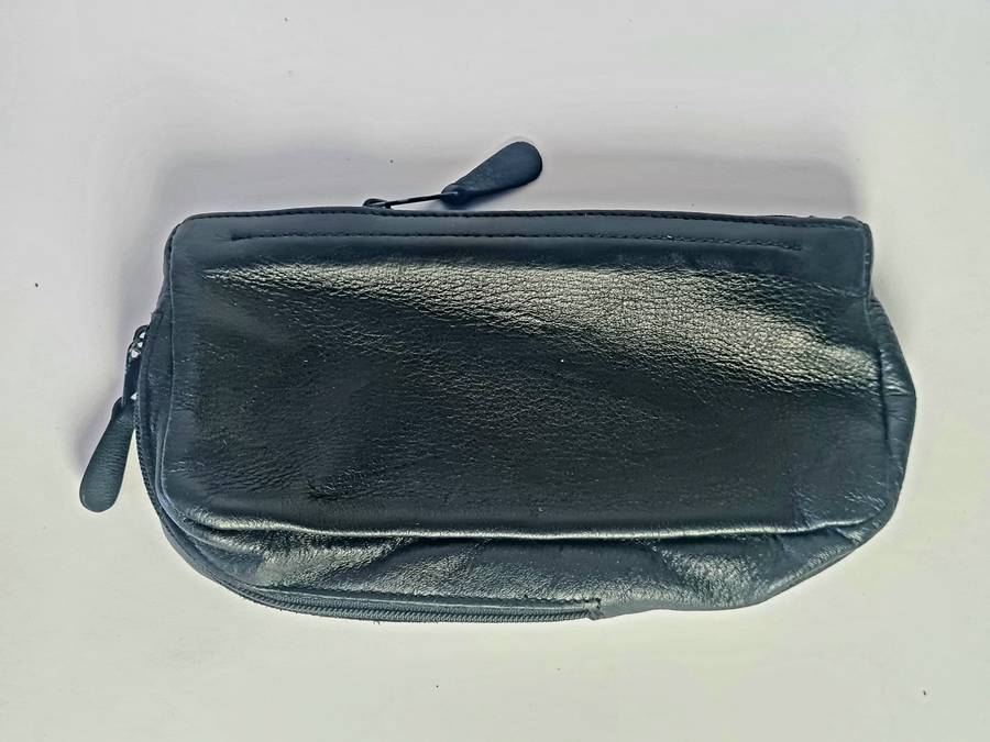Smoking pipe, pipe cleaning tool and tobacco pouch.