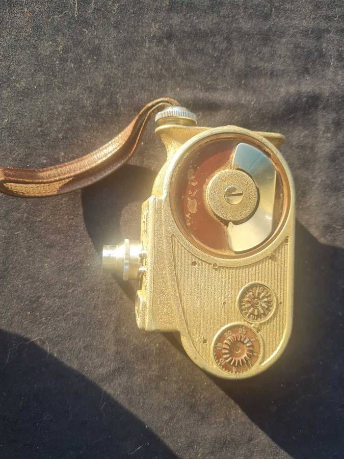 Bell & Howell, sportster. Movie camera.