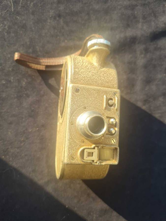 Bell & Howell, sportster. Movie camera.