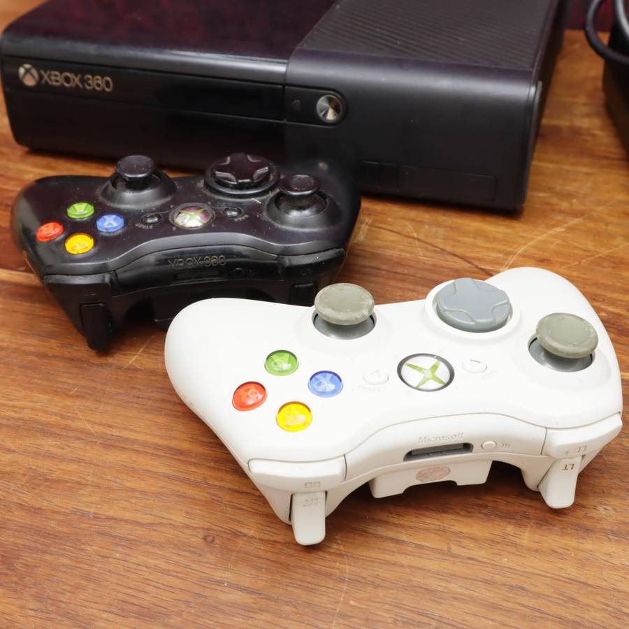 XBox 360E Console Slim - Two Games - Two Controllers