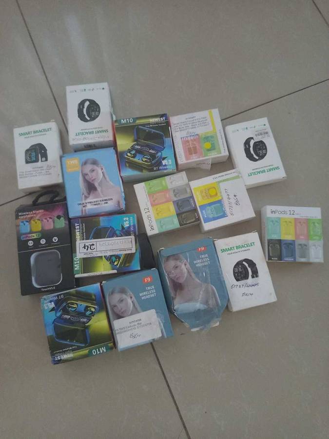 Bulk Lot of ear pods and smart watches