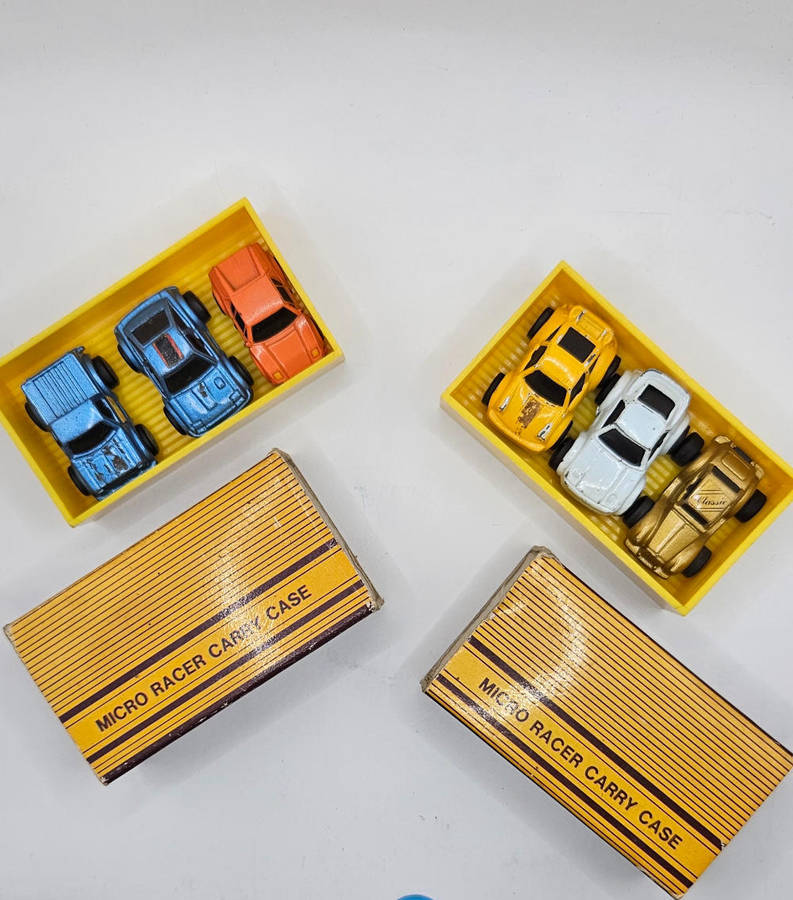 Micro Racer Carry Case sets, from 1988, containing small die-cast cars.