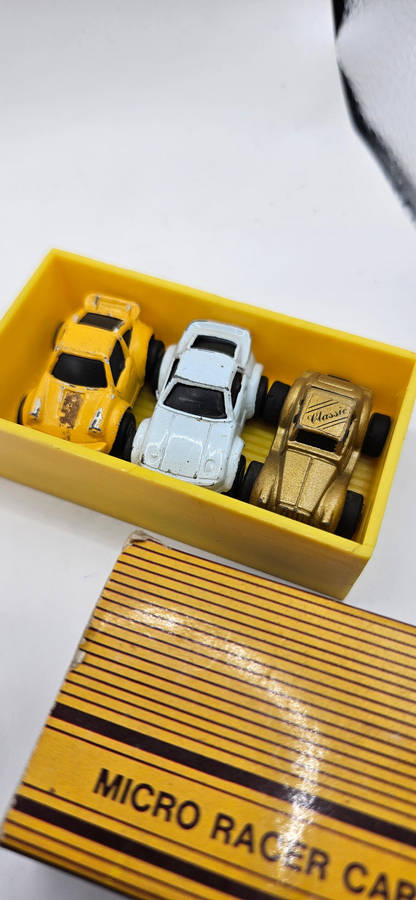 Micro Racer Carry Case sets, from 1988, containing small die-cast cars.