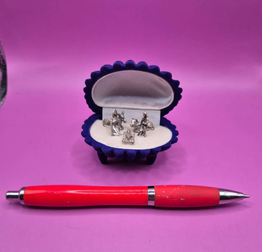 Miniature Nativity scene set in a velvet box.