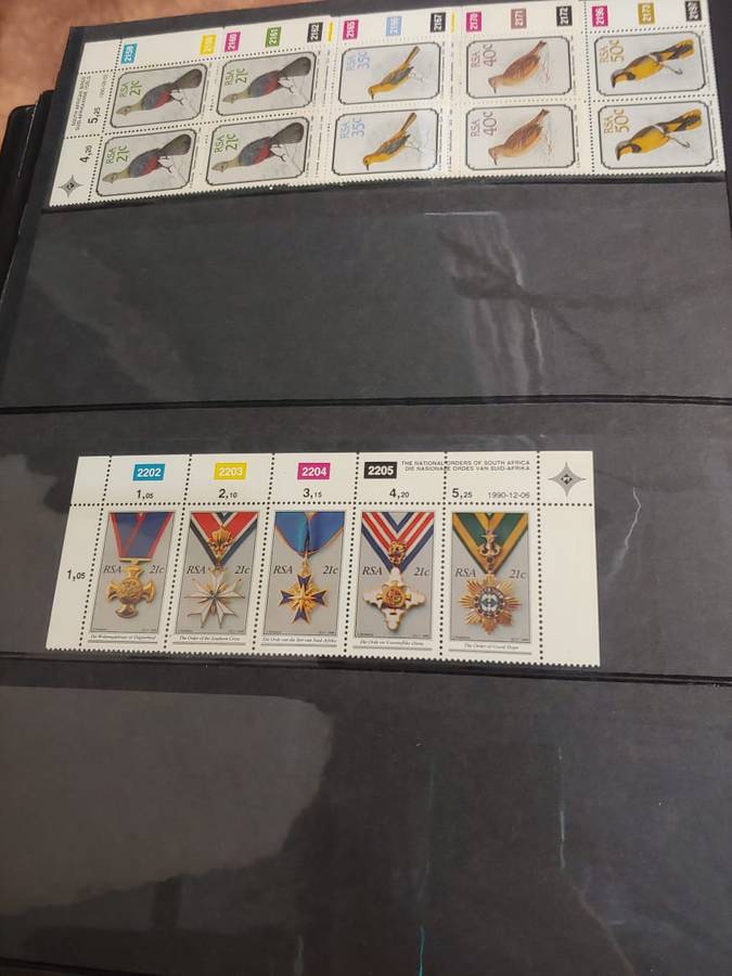 STAMP ALBUM WITH RSA STAMPS DATES FROM 1983 TO 1993