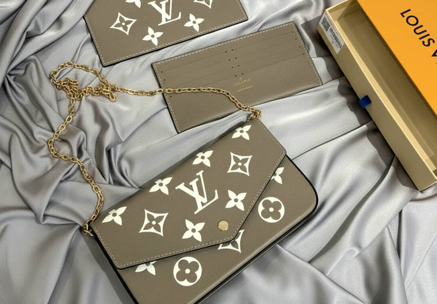 M82610Pochette Félicie Monogram Empreinte leather Tourterelle / Crème