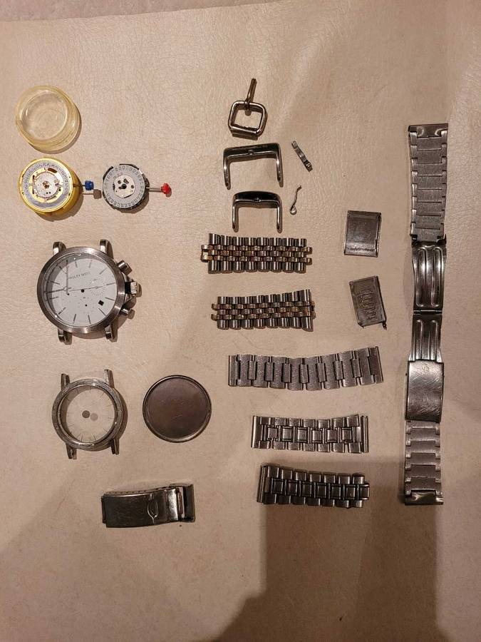 Lot of broken watch parts