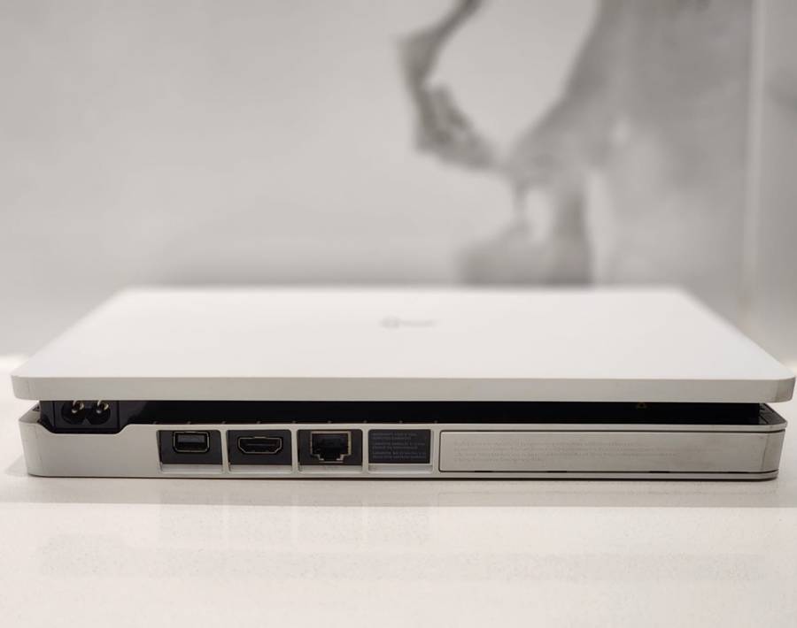 Sony PlayStation 4 Slim 500GB White Console Bundle + 2 Controllers + 7 Games