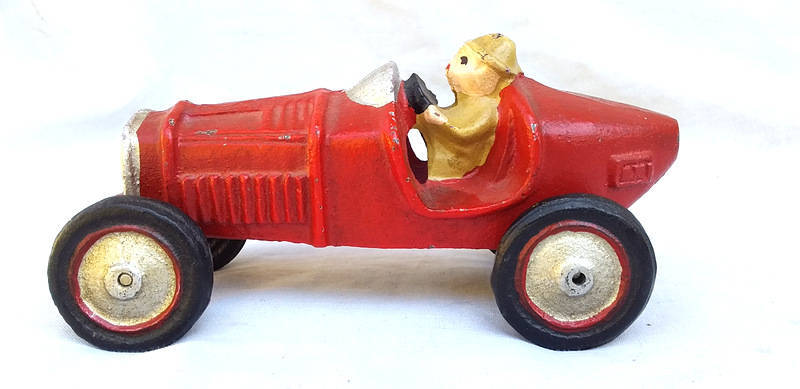 Vintage reproduction of a 1930's cast Iron Red Racer Toy Car