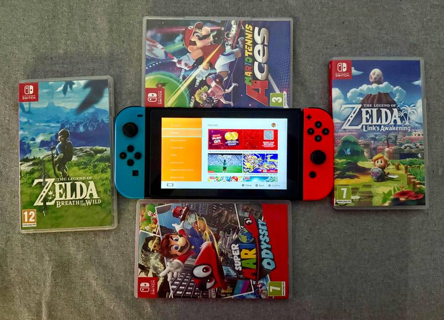 Nintendo Switch, 128GB SD Card, Konix Carry Bag, 4 Games (Links Awakening, BOTW, SMO, Tennis Aces)