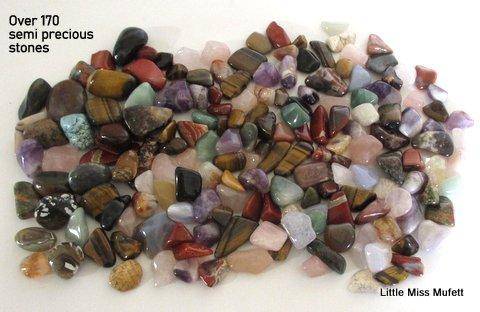 Over 170 Semi precious stones in an old cigar box