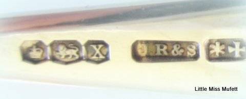 A Hallmarked silver sugar snipper and a Hallmarked silver thimble--Total weight 25 gram