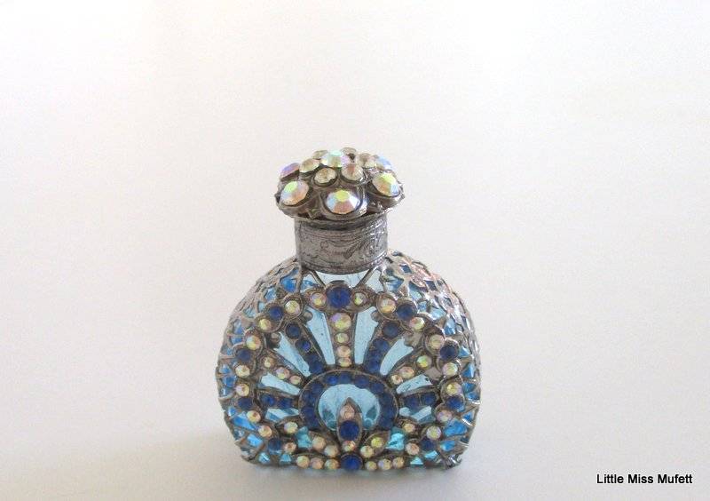 A czechoslovakia  glass perfume bottle with silver tone overlay--Perfect
