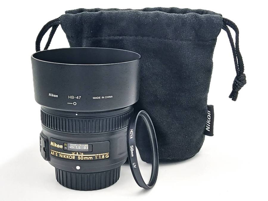 Nikon AF-S Nikkor 50mm 1.8G with Caps, Lens Hood, Hoya UV Filter and original Nikon Bag