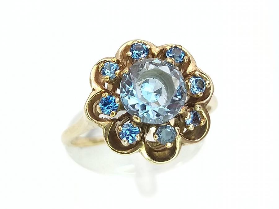 Beautiful 9ct gold blue topaz flower ring