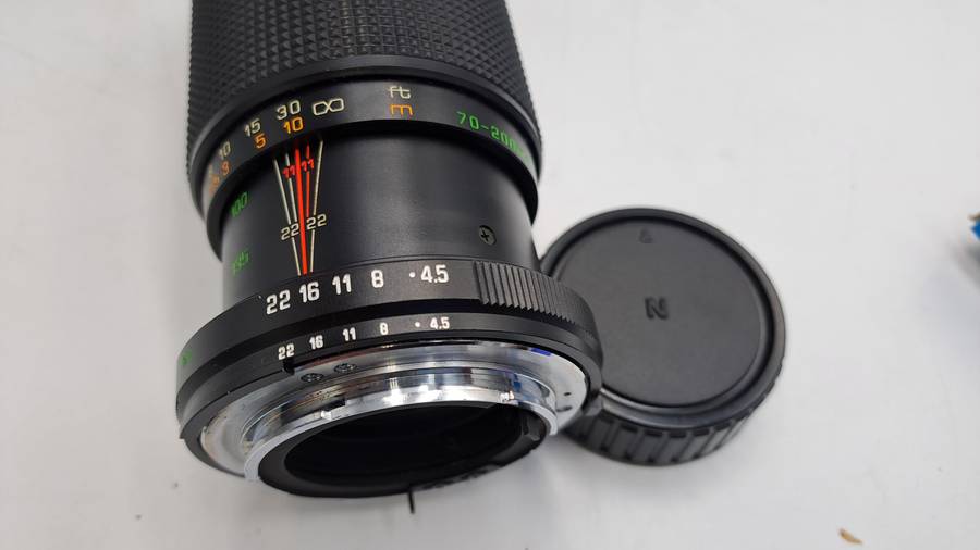 Pre-owned Makinon MC Zoom F70-200m 14,5  - 55mm Auto Focus Lens with bag and caps