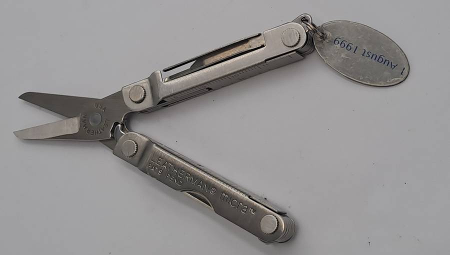Vintage Leatherman Micra Multitool with British American Tabacco August 1999 Tag