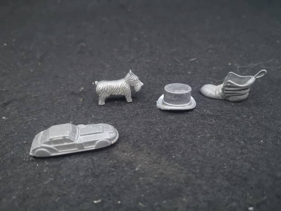 Metal Monopoly pieces