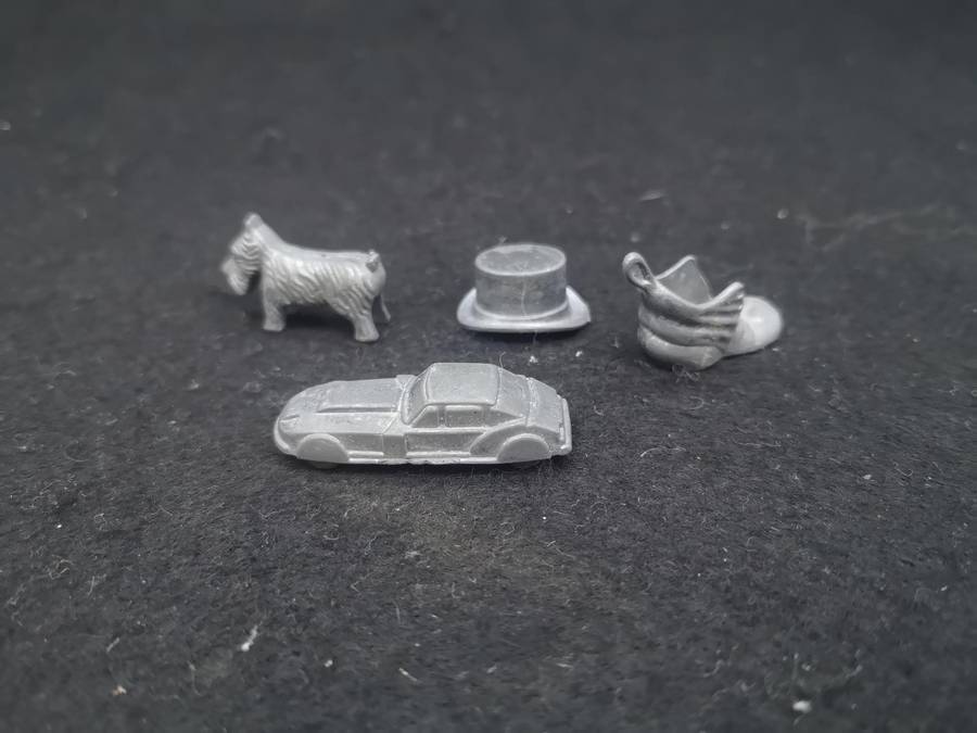 Metal Monopoly pieces
