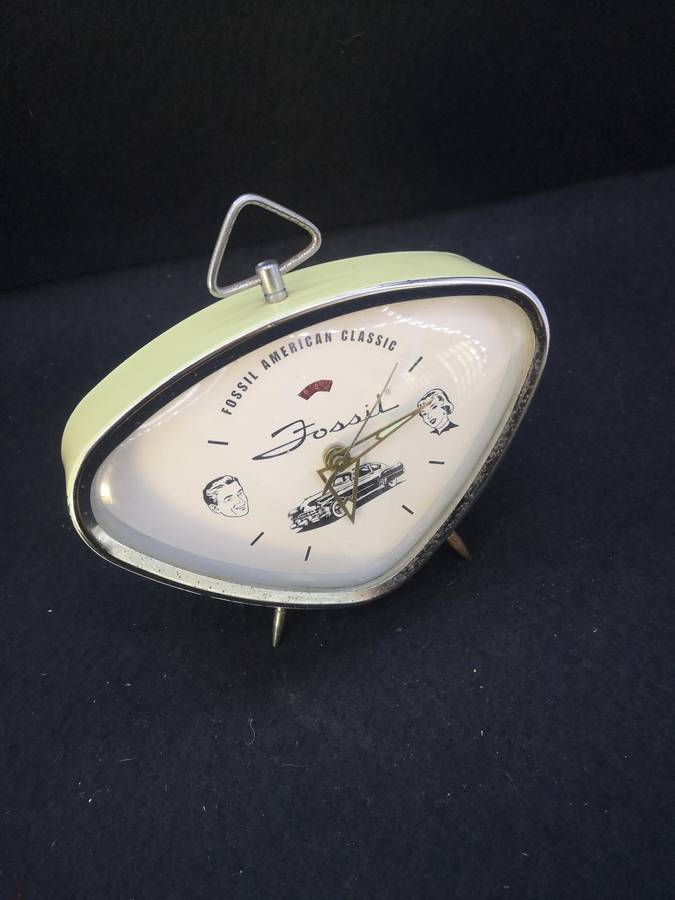 Collectable Fossil wind up alarm clock - alarm not working. Keeps time