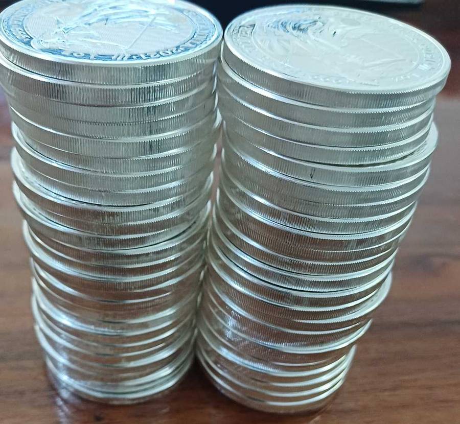 50x2021 1oz .999 silver 2012 2Pounds bid per coin