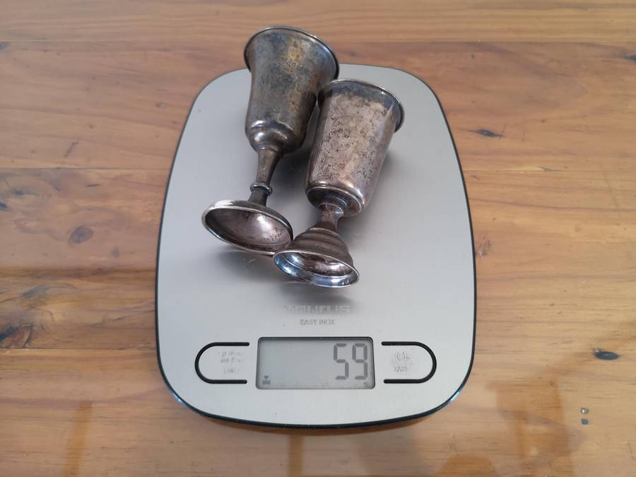 Two small old hallmarked sterling silver trophies