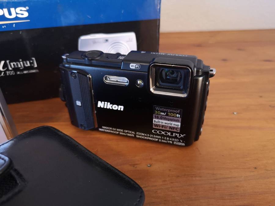 Two faulty digital compact cameras **Nikon & Olympus**