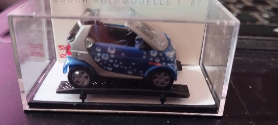 Busch Smart Fortwo Cabrio - Förstina Sprudel- 1/87 Scale