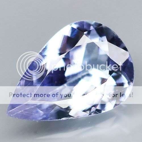 0.64ct - FLASHING Pear Violet Blue NATURAL TANZANITE