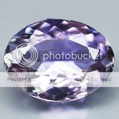 1.81ct - FLASHING Oval Violet Blue TANZANITE