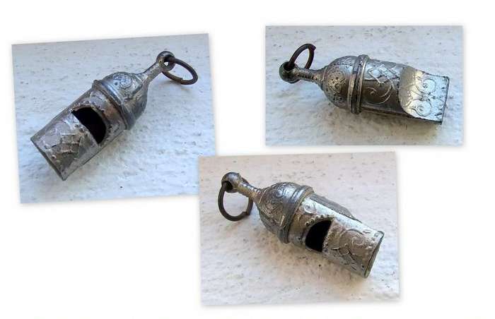 A delicate old chatelaine whistle