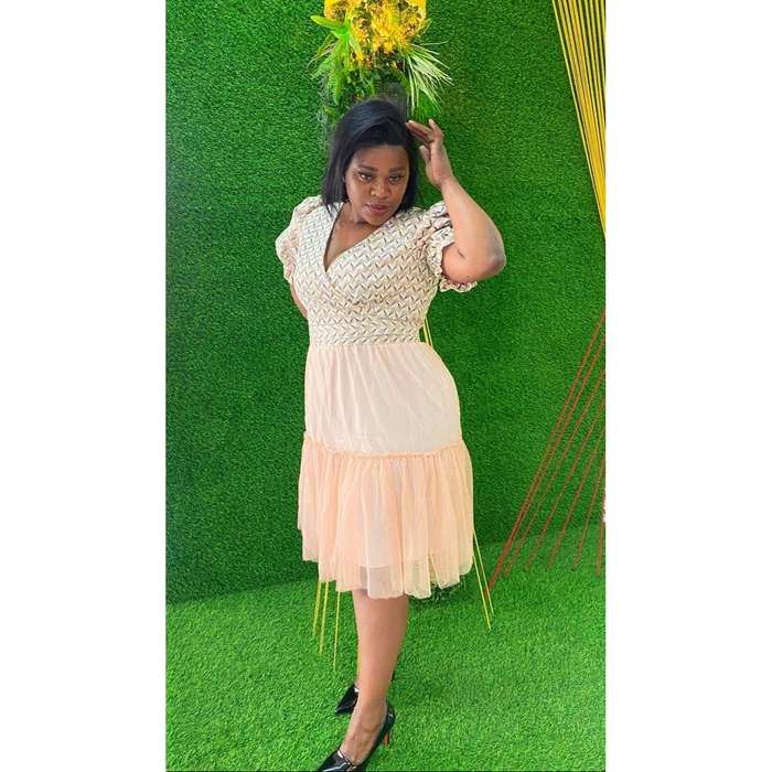Honey-Comb Mesh Shirt and Pleated Skirt.