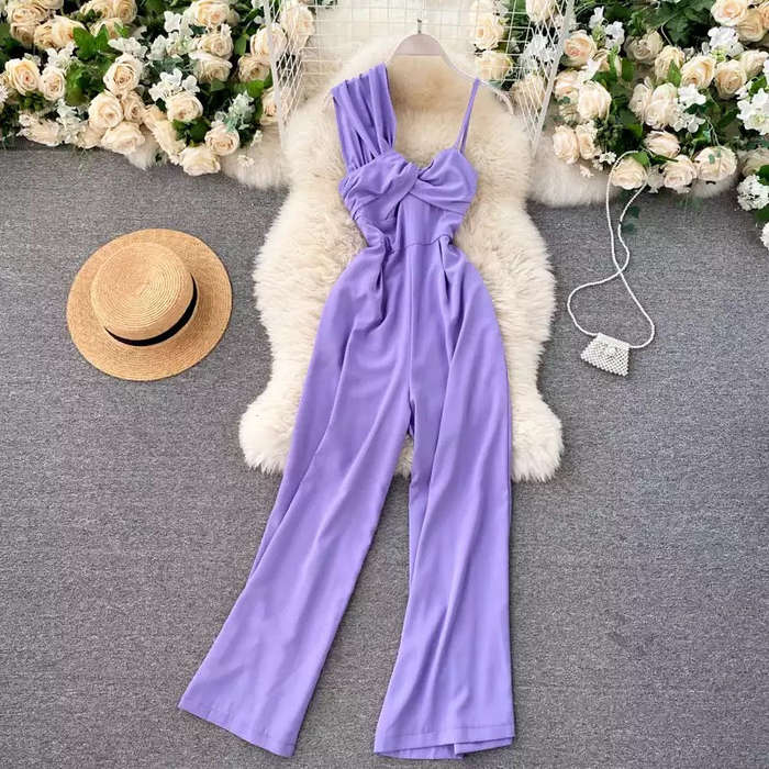 Asymmetrical off-the-shoulder twisted jumpsuit.