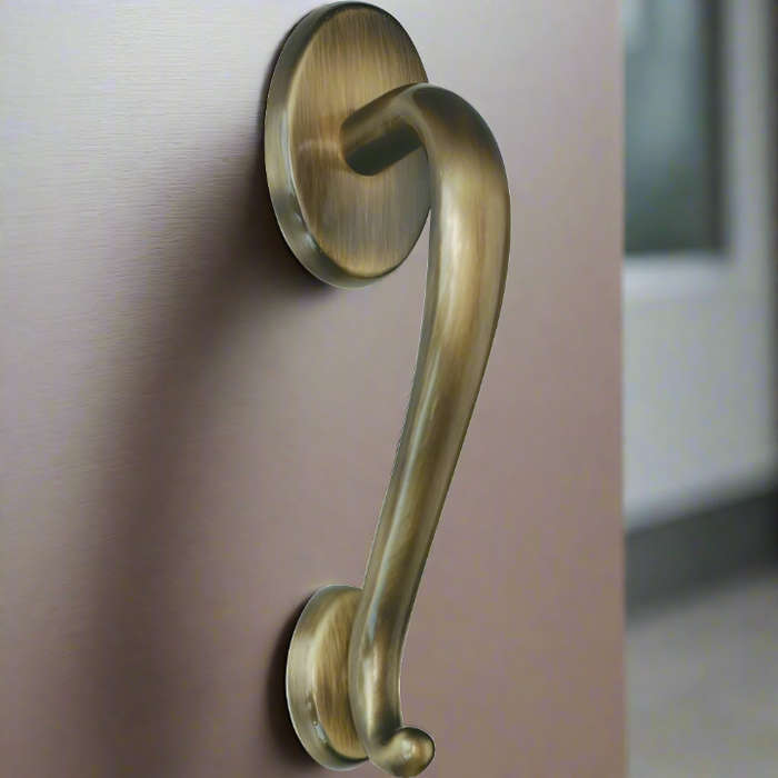 "Joker" - Bespoke door handles from Tupai Handles - Bolt through