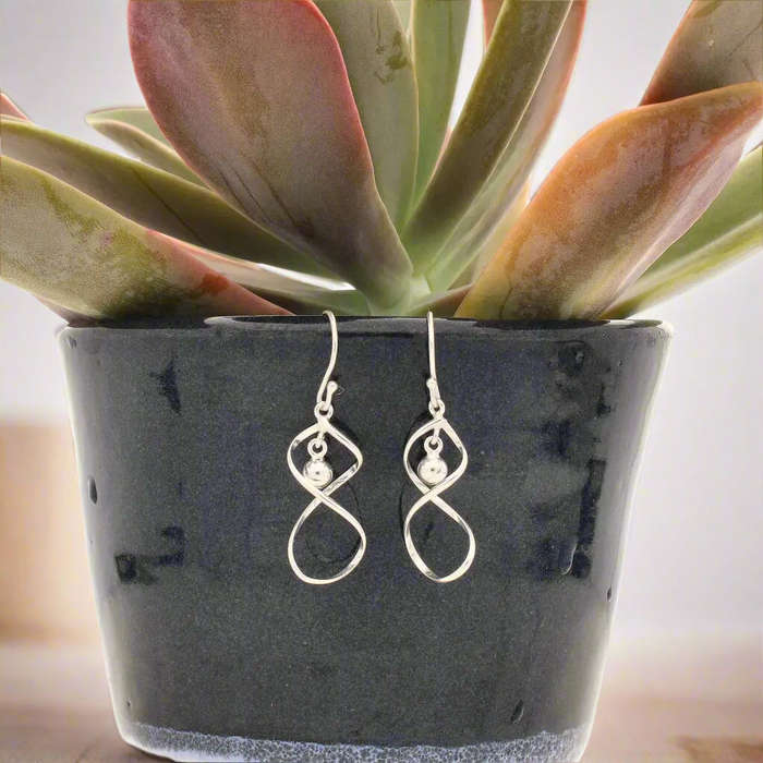 Twist & Shout: Modern Sterling Silver Double Twist Dangle Earrings!