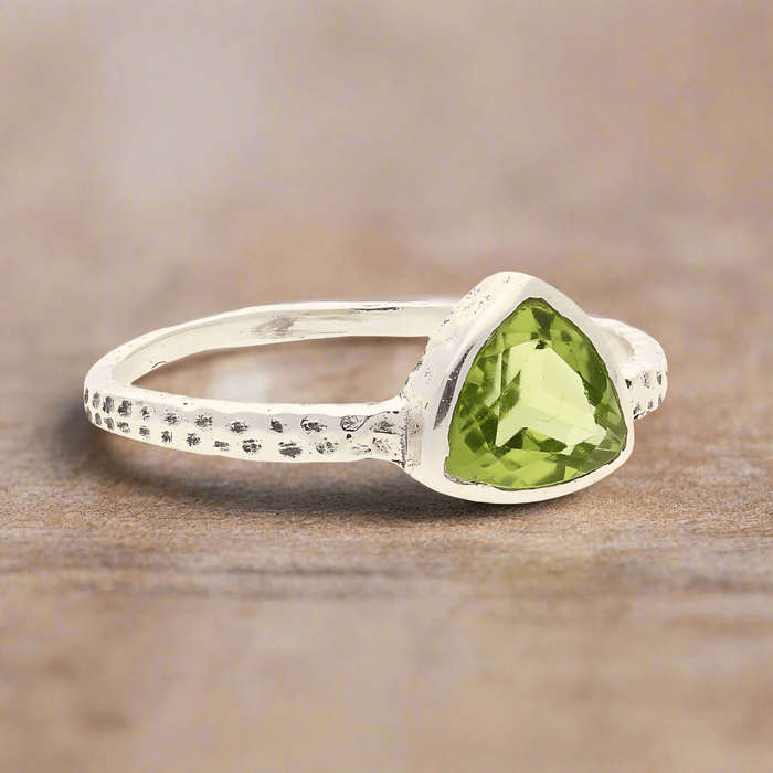 Peridot Radiance: Trillion Spark Sterling Silver Ring