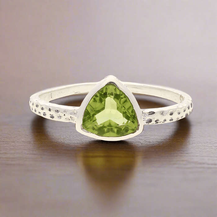 Peridot Radiance: Trillion Spark Sterling Silver Ring