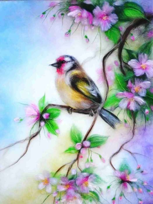 Bird sitting on tree branch