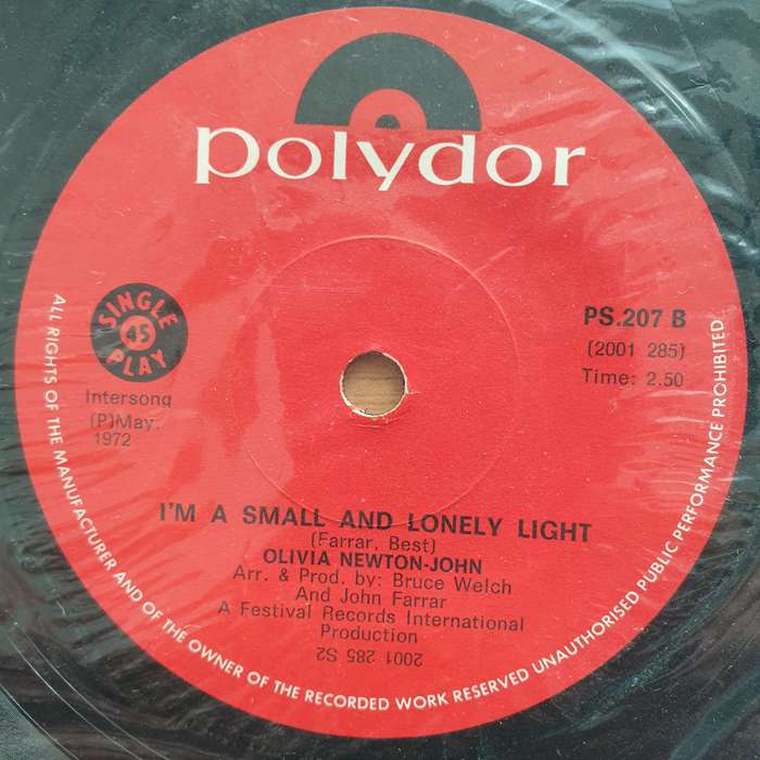 Olivia Newton-John  What Is Life - Vinyl 7" Record - Very-Good+ Quality (VG+) (verygoodplus7)