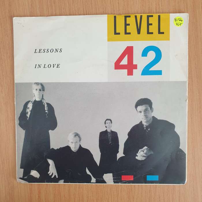 Level 42  Lessons In Love - Vinyl 7 Record  (VG+) (Aryeh)