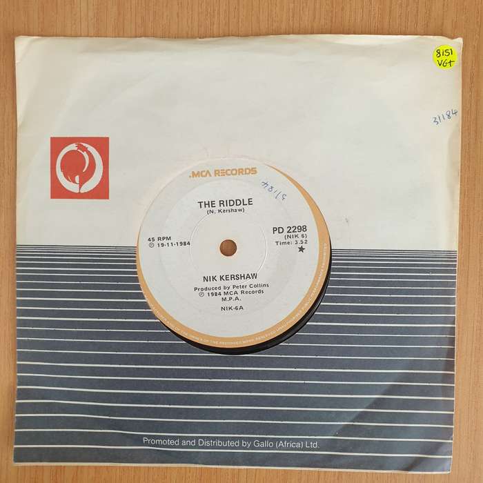 Nik Kershaw  The Riddle - Vinyl 7 Record  (VG+) (Aryeh)