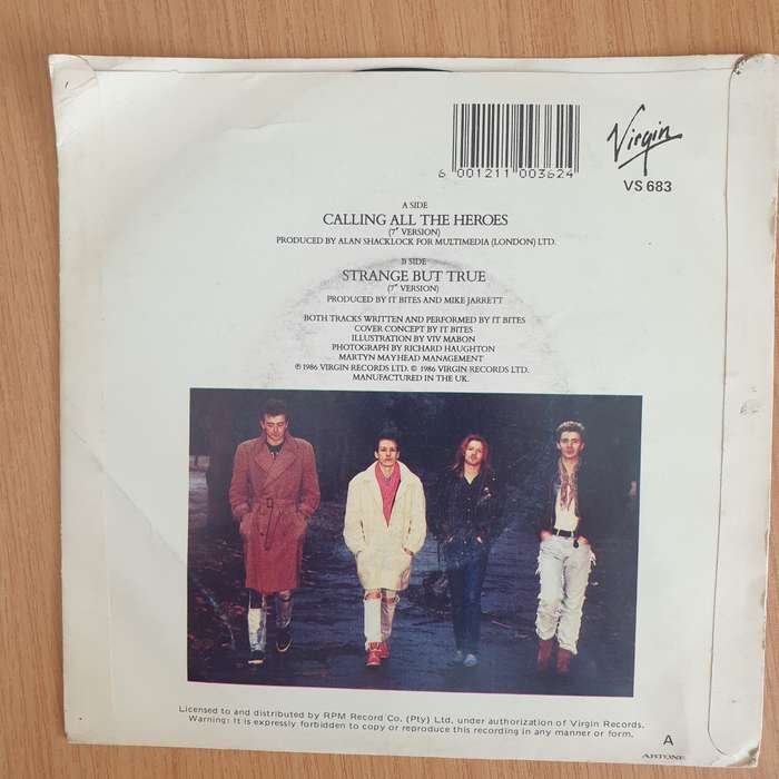 It Bites  Calling All The Heroes - Vinyl 7 Record  (VG+) (Aryeh)
