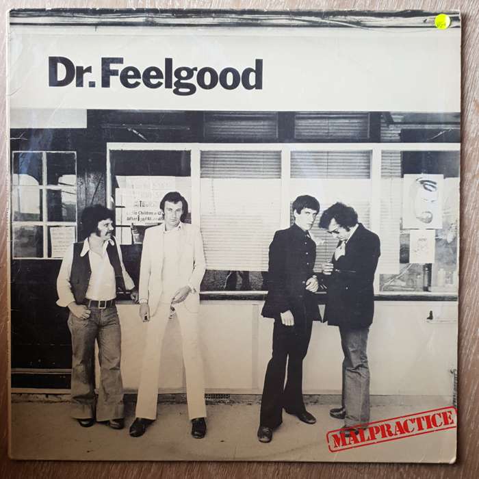 Dr. Feelgood  Malpractice - Vinyl LP Record - Very-Good+ Quality (VG+)