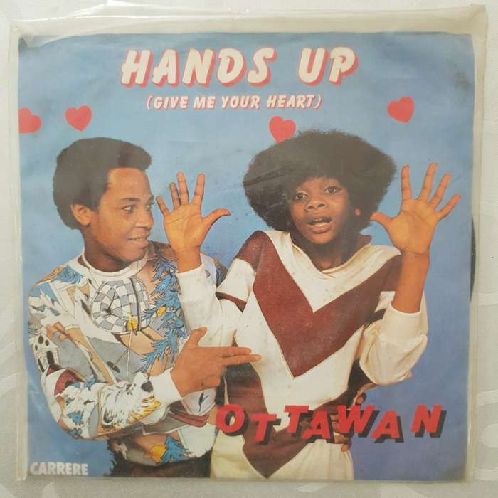 Ottawan  Hands Up (Give Me Your Heart) - Vinyl 7" Record - Opened  - Good+ Quality (G+)