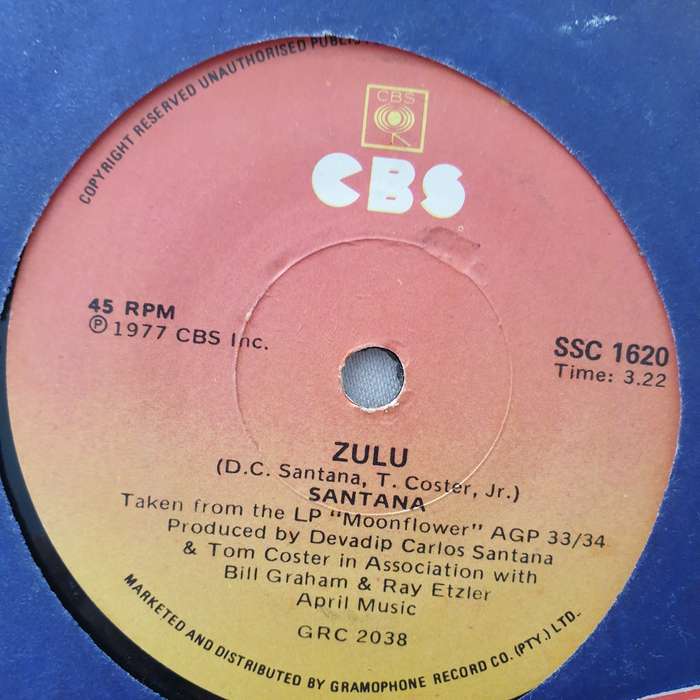 Santana  She's Not There/Zulu - Vinyl 7" Record - Very-Good+ Quality (VG+)